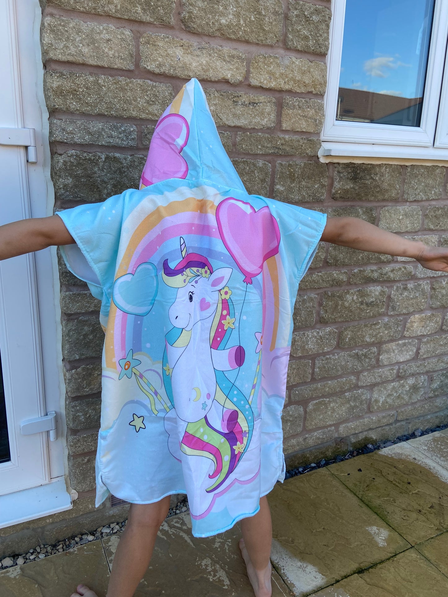 Unicorn and balloons poncho towel